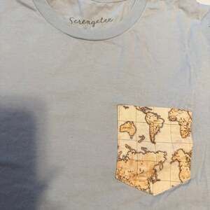 Serengetee World Map Pocket T-Shirt Heather Light Blue